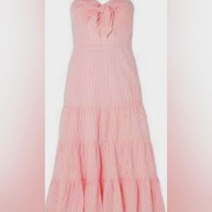 Pink strapless dress with a candy stripper lined design